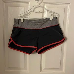 Lulu lemon 2.5 running shorts, gray with hot pink accents, size 4